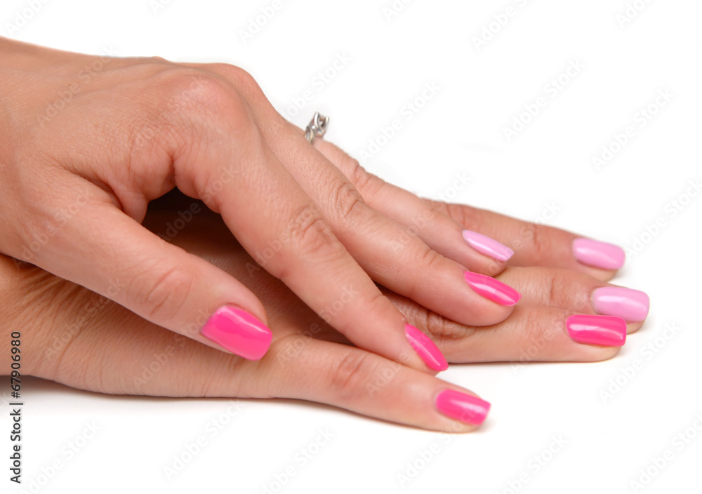 Women's hands with a colored nail polish