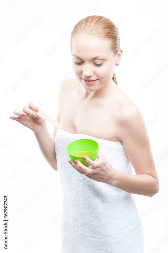 Young fresh attractive woman in towel preparing natural homemade Young fresh attractive woman in towel preparing natural homemade
