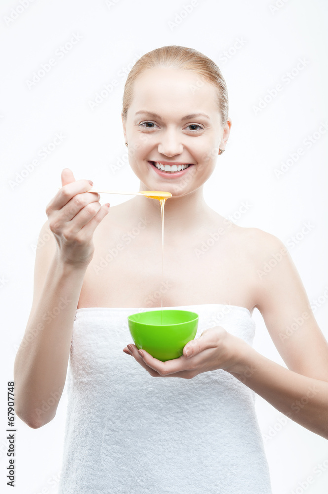 Young fresh attractive woman in towel preparing natural homemade Young fresh attractive woman in towel preparing natural homemade