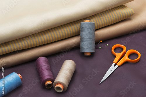 Thread Spools, Pin and Scissors.