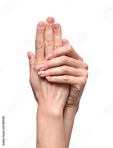 Close up of female hands with  french manicure isolated