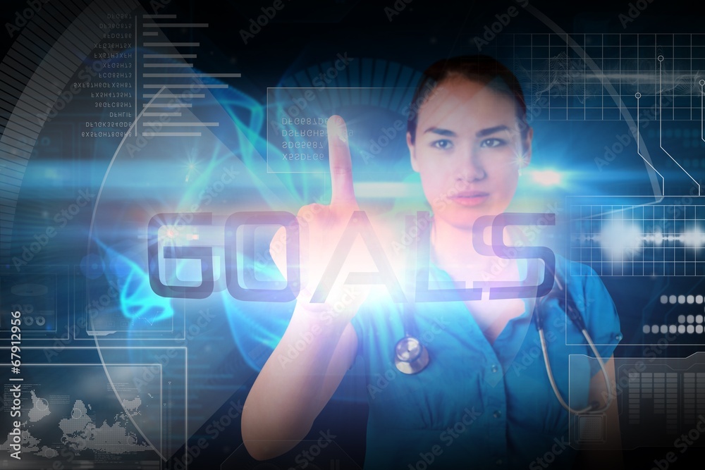 Doctor pointing to the word goals Doctor pointing to the word goals