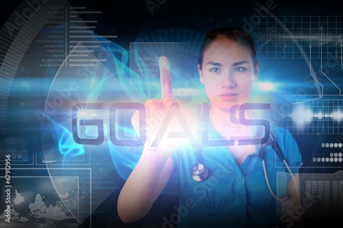 Doctor pointing to the word goals