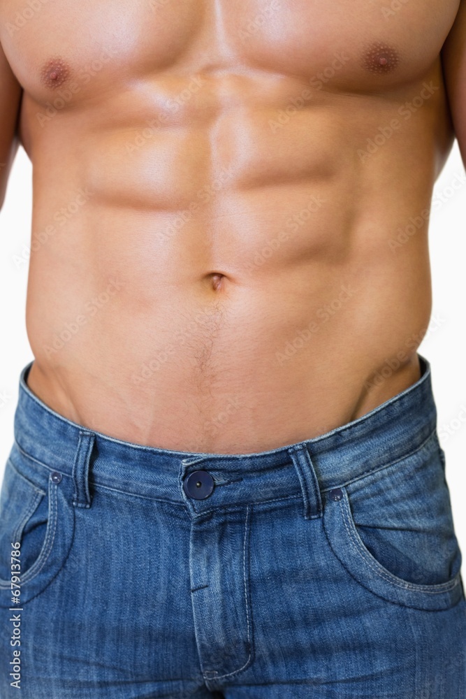 Naklejka premium Mid section of a shirtless muscular man
