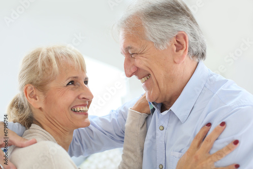 Cheerful senior couple laughing outloud