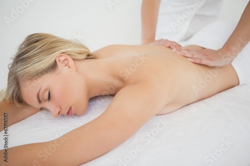 Beautiful blonde enjoying a massage
