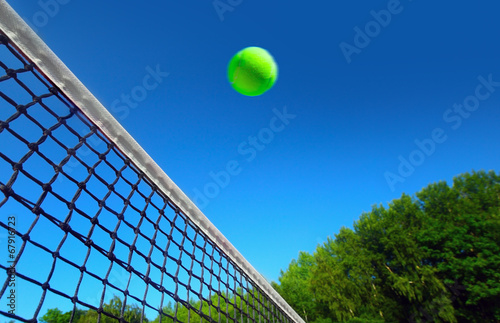 Tennis ball on net´s edge © Mikael Damkier