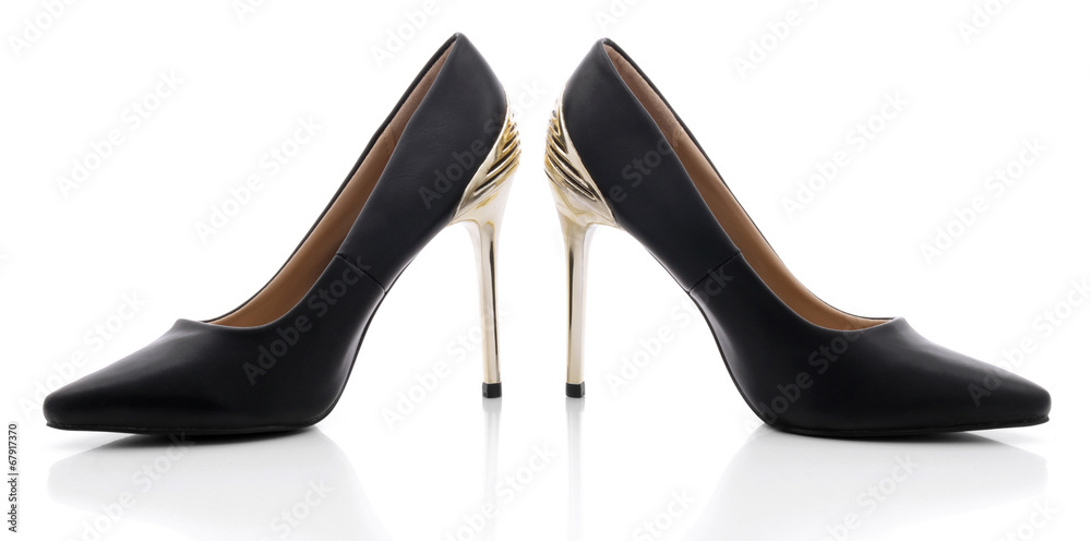 Sexy black shoes with high gold heels on white background - obrazy, fototapety, plakaty 