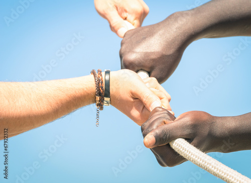 Tug of war - Concept of interracial multi ethnic union