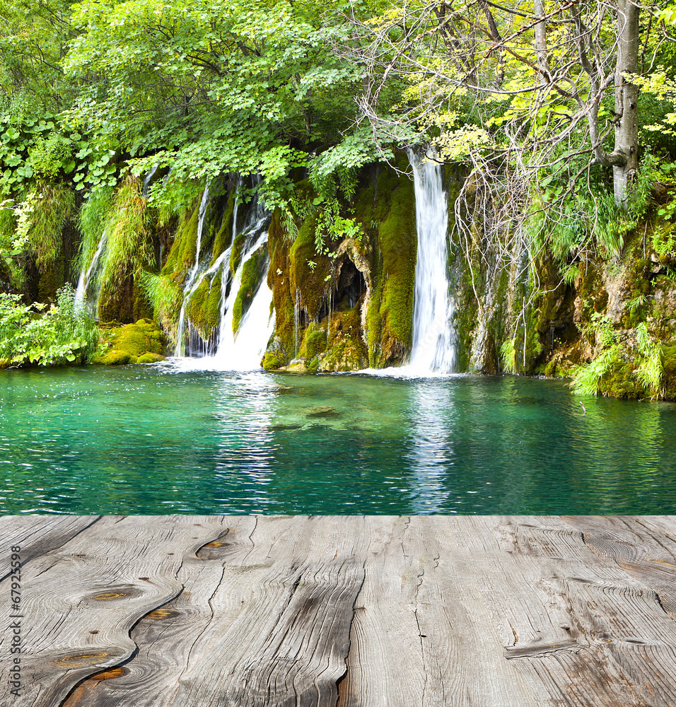 Naklejka premium waterfall and wood pier