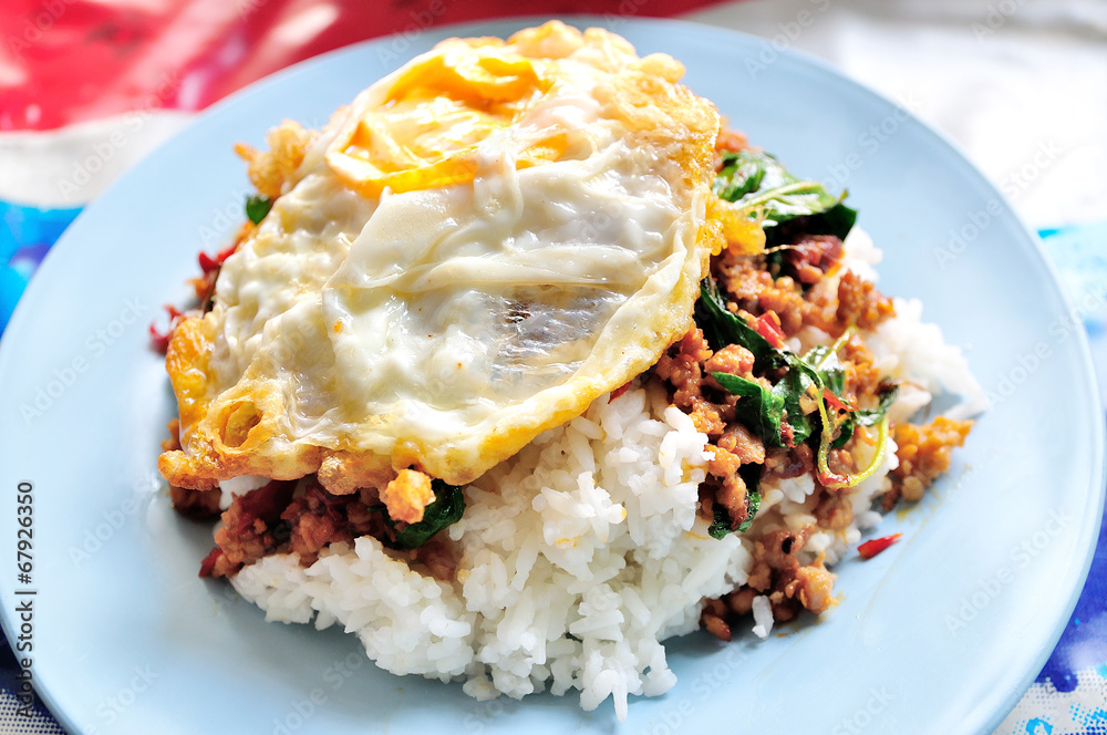 stir fried minced pork and chili ,basil served with steamed rice stir fried minced pork and chili ,basil served with steamed rice