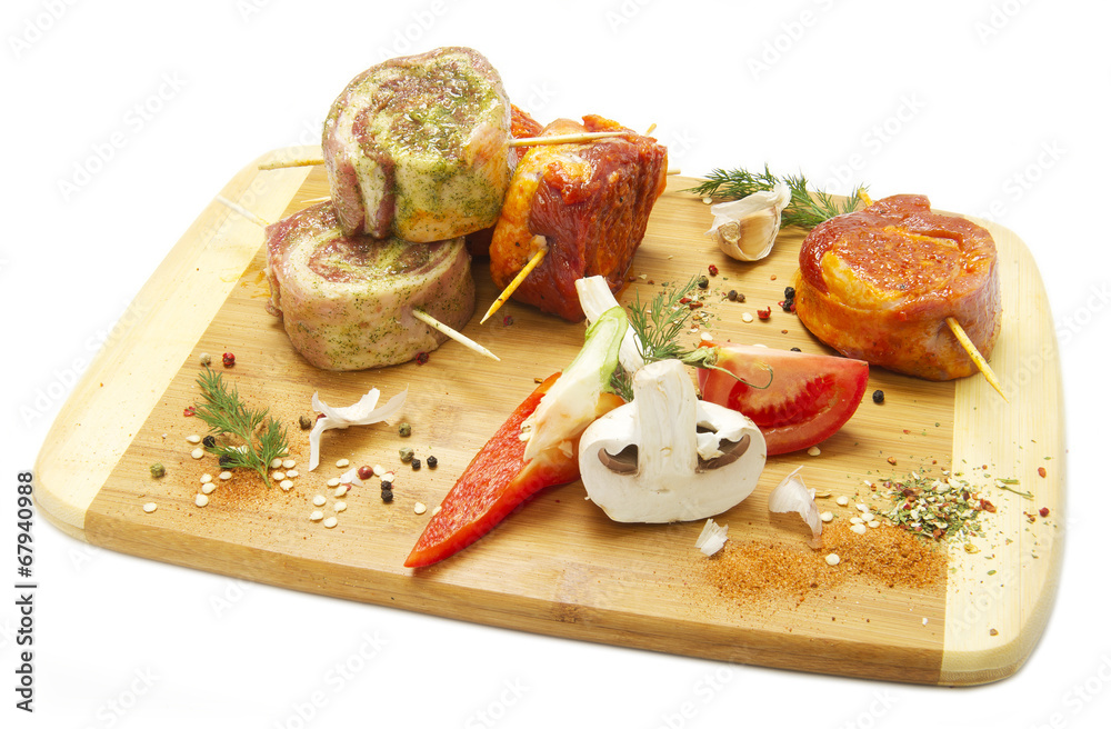 pieces of raw meat on the board pieces of raw meat on the board