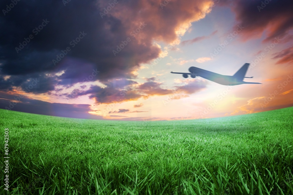 Obraz premium Composite image of airplane taking off