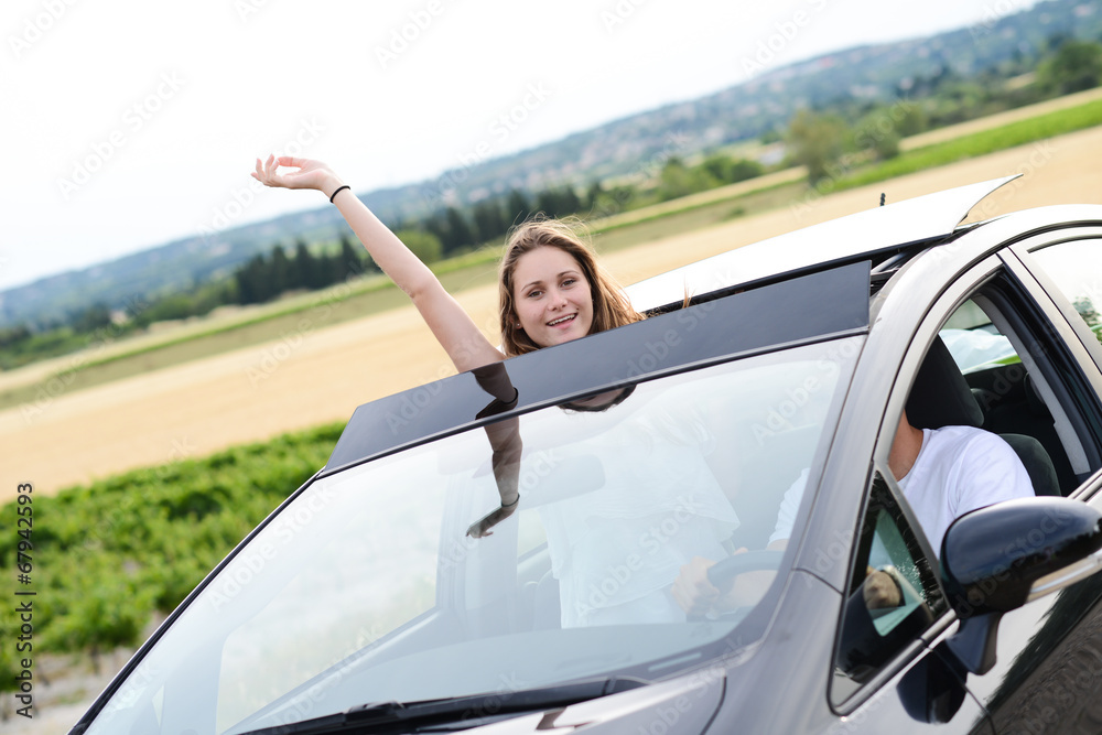 happy young couple driving new car holiday trip summertime happy young couple driving new car holiday trip summertime