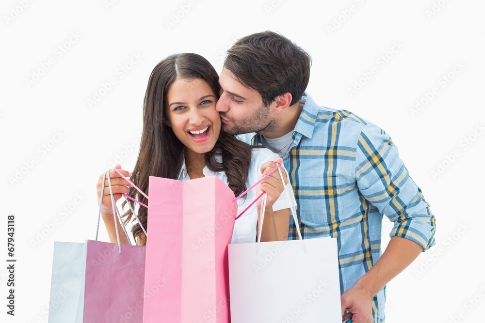 Attractive young couple with shopping bags Attractive young couple with shopping bags
