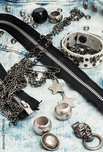 composition with sewing accessories and skull jewelry