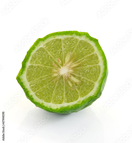 Kaffir lime on white background photo