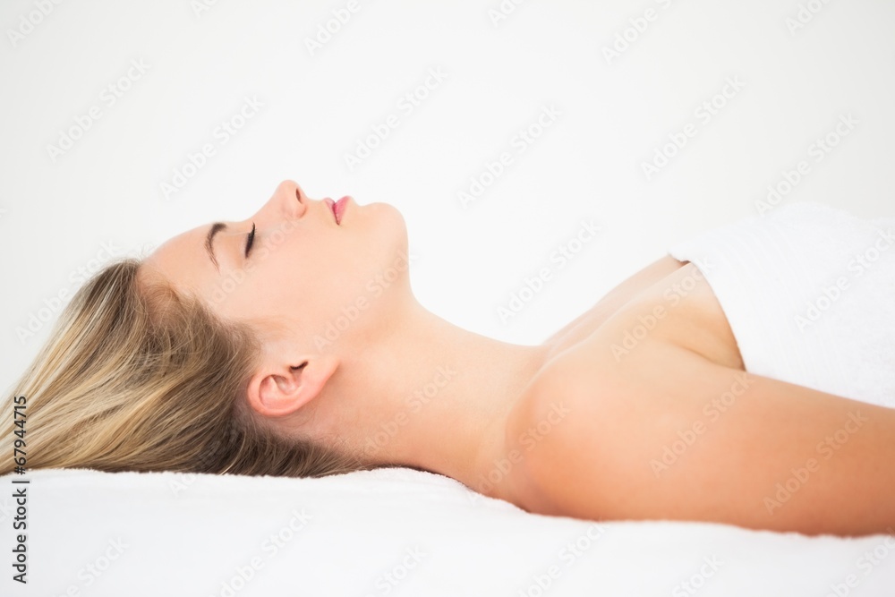 Beautiful blonde lying on massage table Beautiful blonde lying on massage table