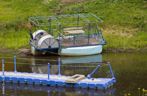 Old river pontoon boat