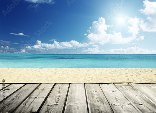 tropical beach and wooden platform