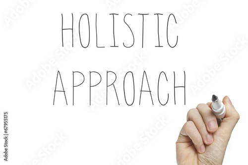 Hand writing holistic approach photo