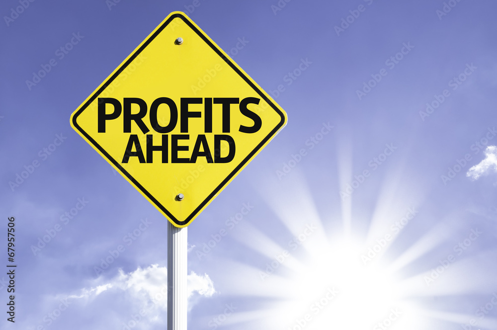 Profits Ahead road sign with sun background Profits Ahead road sign with sun background