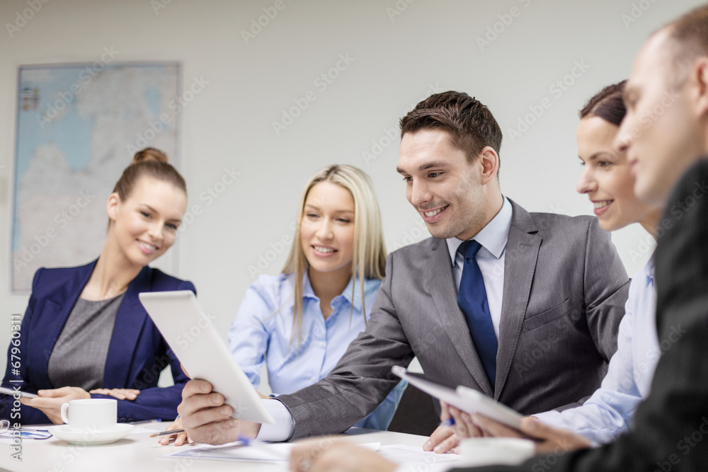 business team with tablet pc having discussion business team with tablet pc having discussion