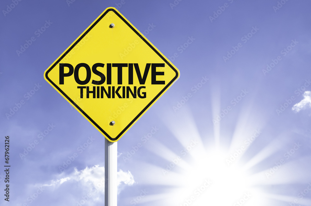 Positive Thinking road sign with sun background Positive Thinking road sign with sun background