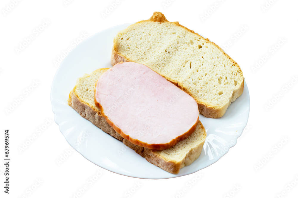 Bread with juicy boiled pork on a ceramic plate Bread with juicy boiled pork on a ceramic plate