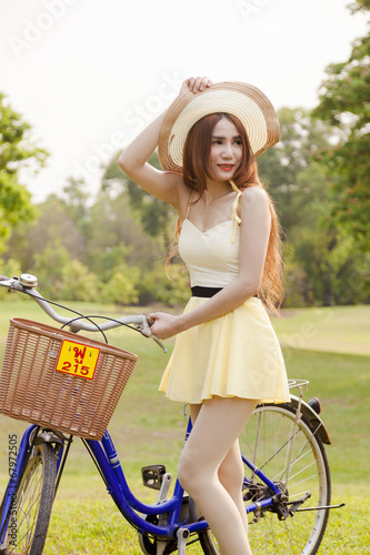 Asian woman and bicycle