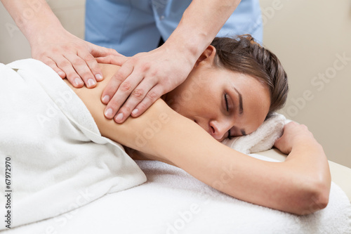 Lady having back massage