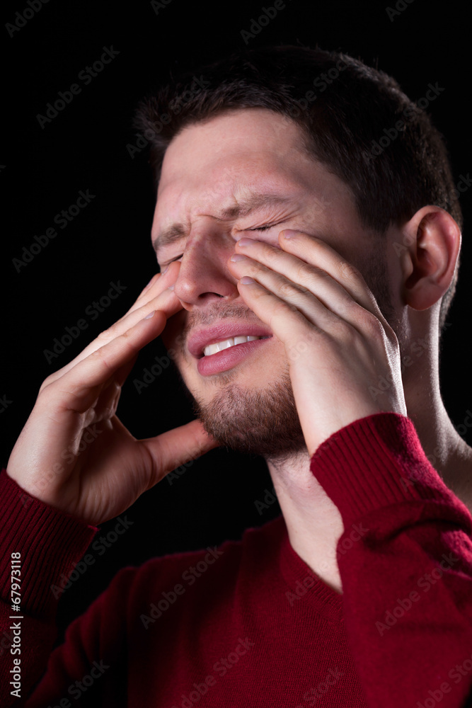 Man with sinus pain Man with sinus pain