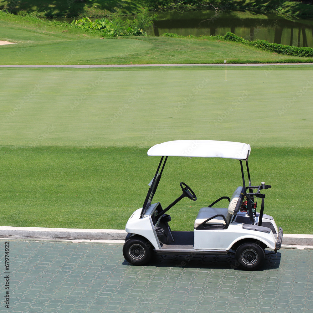 golf car in green golf course