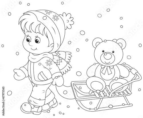 Child walking with her sledge and toy bear