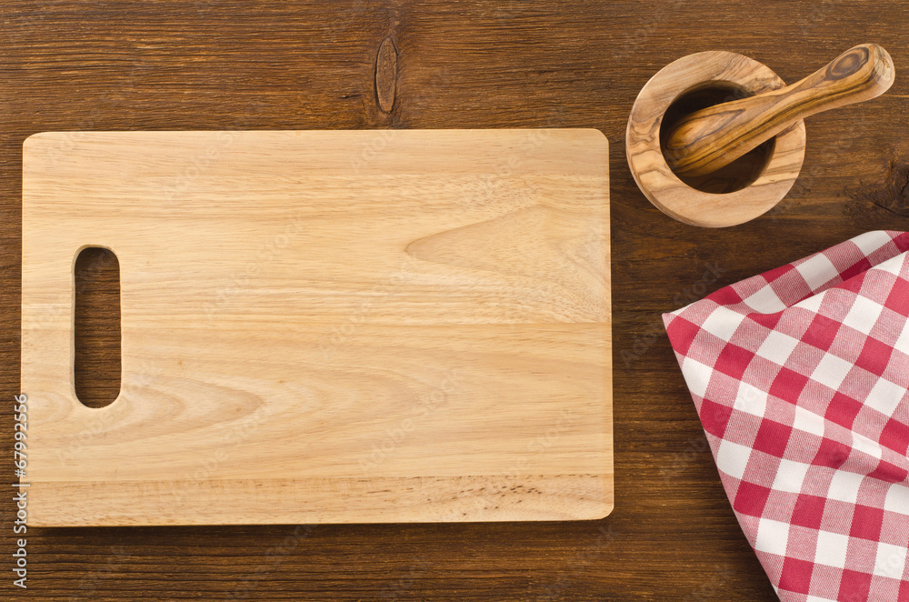 Cutting board with tablecloth and bowl