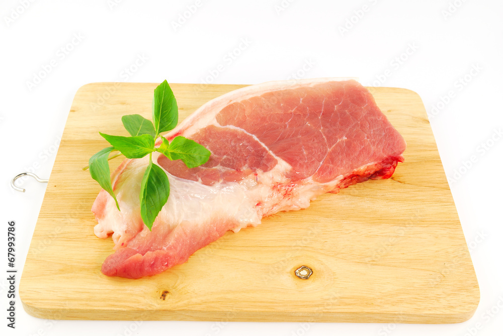 Fresh pork meat on a cutting board Fresh pork meat on a cutting board
