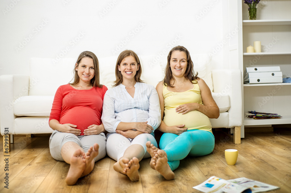 Pregnant women on sofa