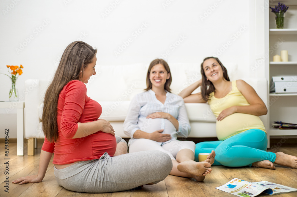 Pregnant women on sofa Pregnant women on sofa