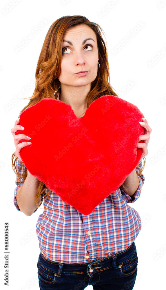 woman holding a toy heart woman holding a toy heart