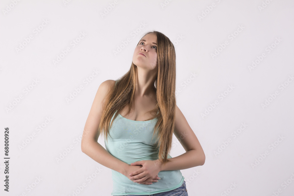 pensive young woman looking up pensive young woman looking up