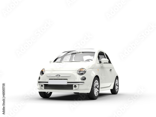 Small economic white car front © technicolors