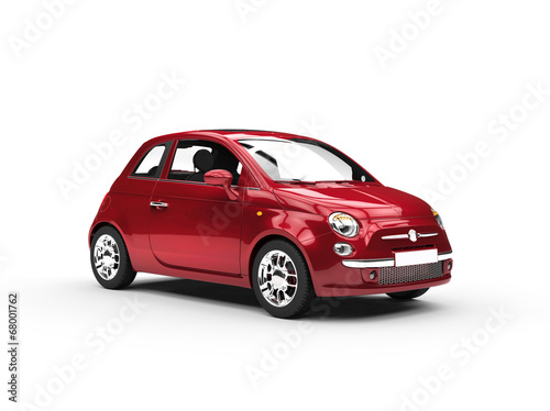 Small cherry colored economic car