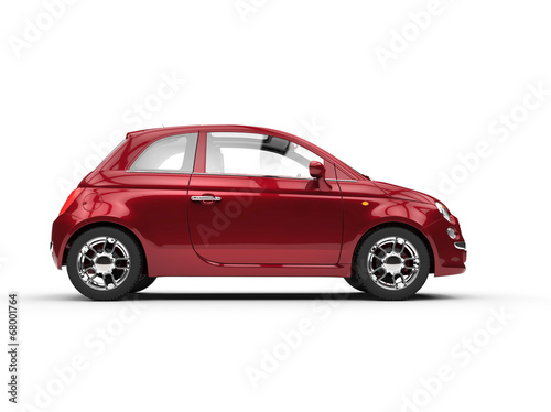 Small cherry colored economic car side