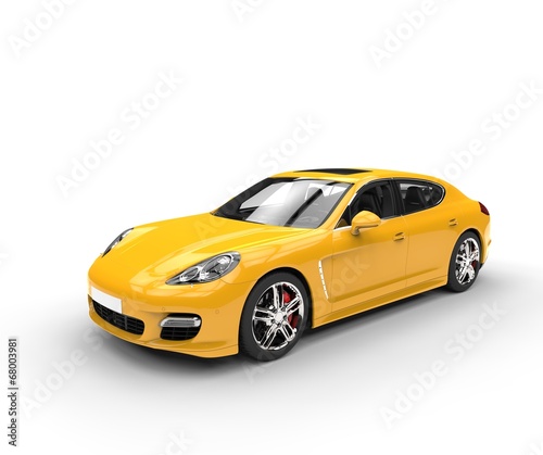 Fast yellow car top side shot © technicolors