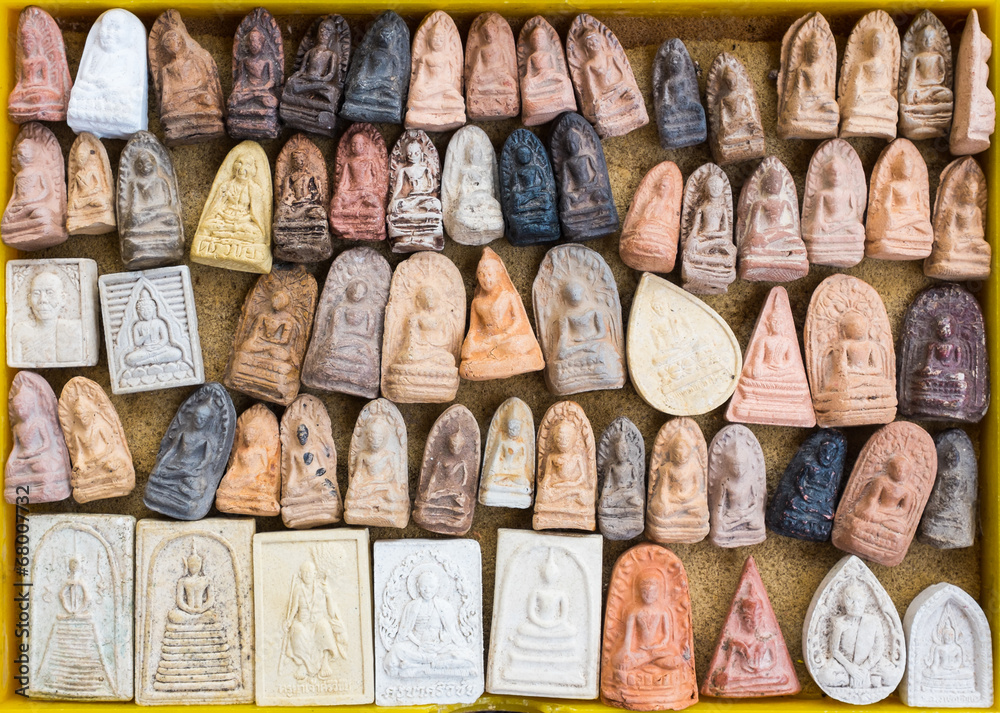 Obraz na plátně small buddha image used as amulet