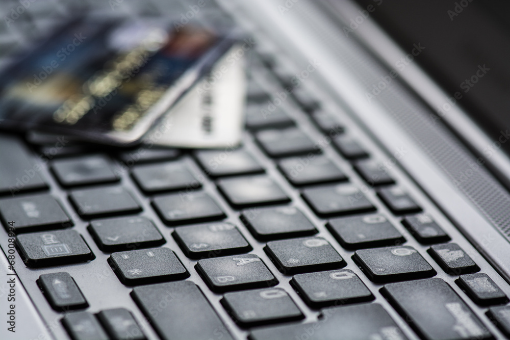 Concept of online shopping with keyboard and credit card Concept of online shopping with keyboard and credit card