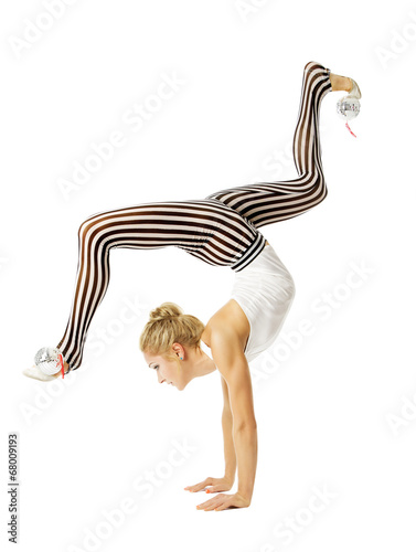 Gymnast woman flexible body standing on arms, training stretchin photo