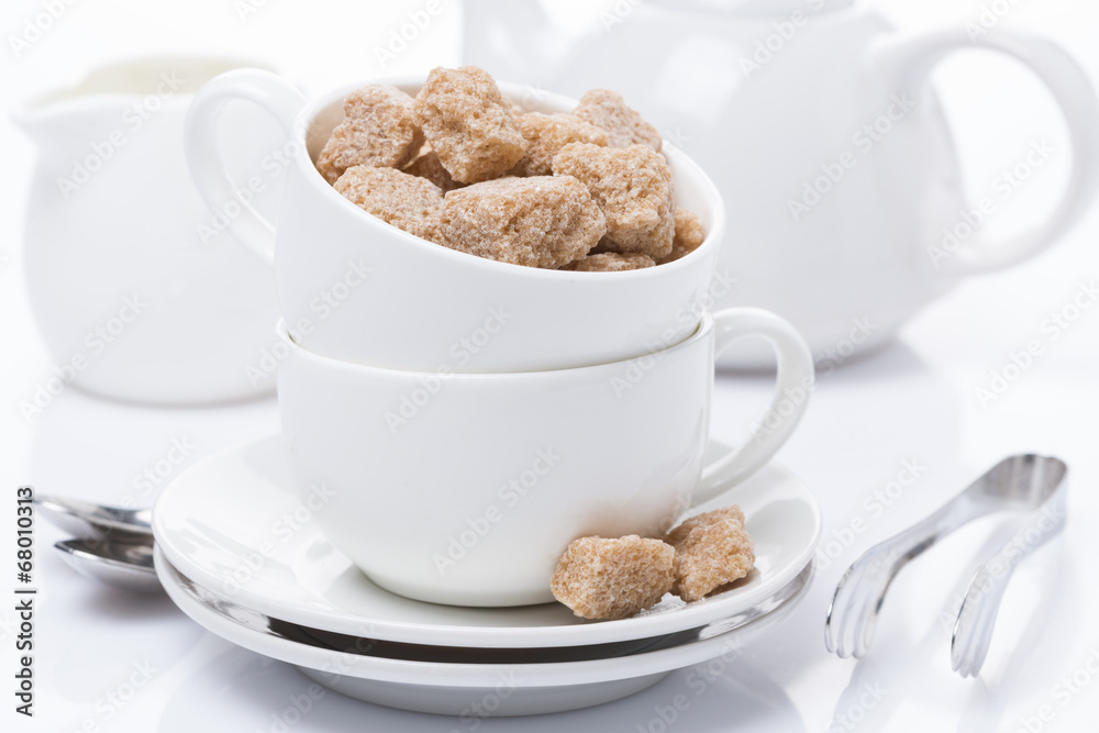 utensils for teatime and brown sugar, close-up utensils for teatime and brown sugar, close-up