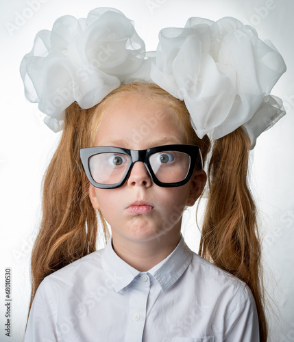 Girl in glasses close up portrait photo