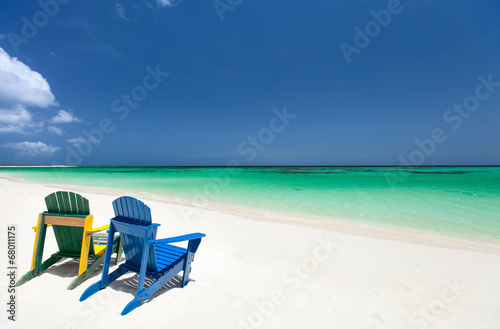 Colorful lounge chairs at Caribbean beach